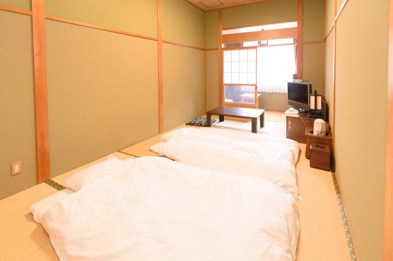 קומאנו Business Hotel Kawakami מראה חיצוני תמונה